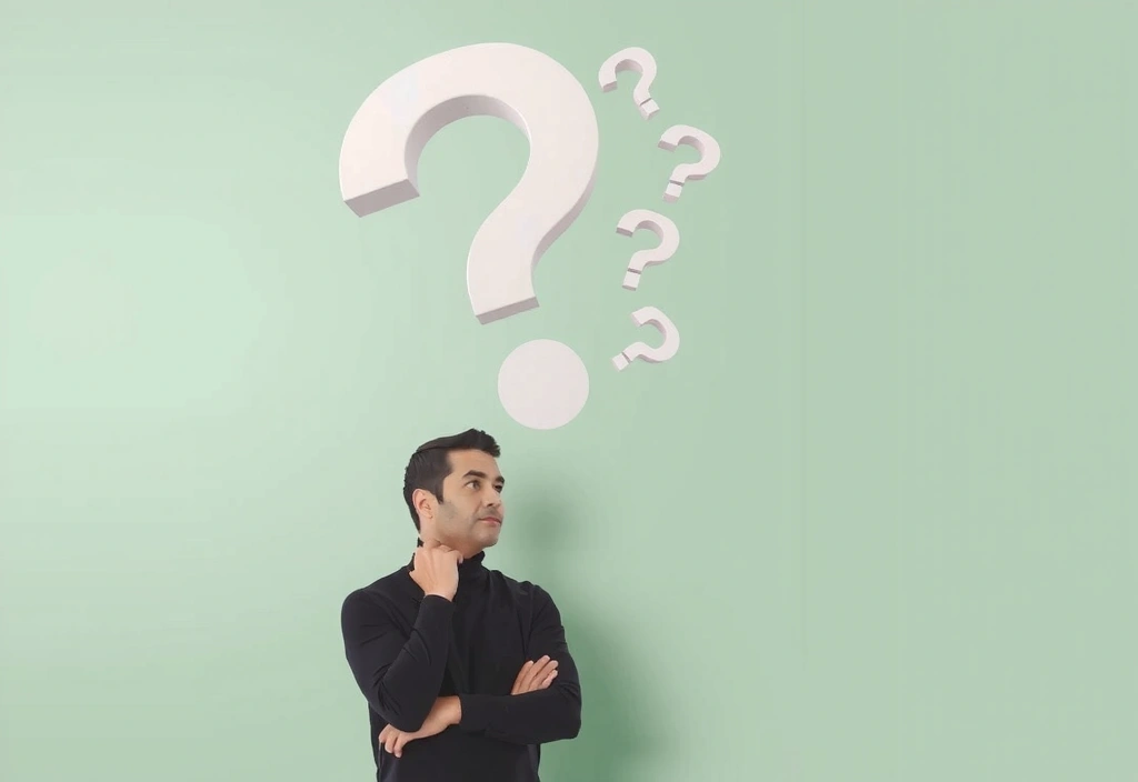 Eine Person, die nachdenklich ein großes Fragezeichen betrachtet, symbolisiert häufig gestellte Fragen und Antworten.
